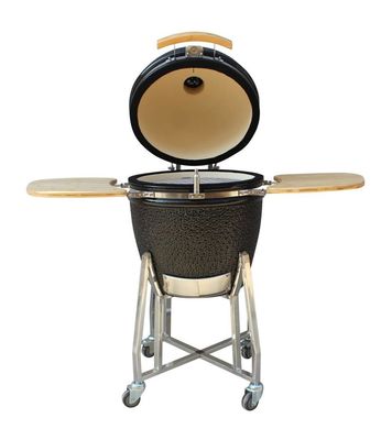 El carbón de leña al aire libre Kamado de cerámica asa a la parrilla el acero inoxidable del color del negro de 22 pulgadas